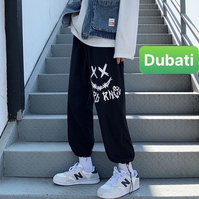 QUẦN JOGGER NAM NỮ UNISEX CHẤT NỈ DÀY DA CÁ ỐNG SUÔNG RỘNG IN HÌNH MẶT CƯỜI PHONG CÁCH SÀNH ĐIỆU NEW - DUBATI FASHION