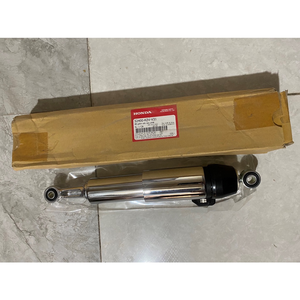 Giảm sóc sau bên phải - phuộc sau HONDA SUPER DREAM.