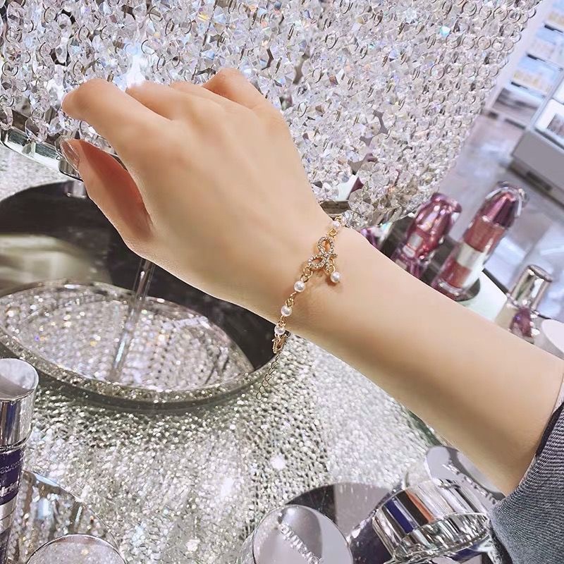 Vòng Tay Thắt Nơ Đính Ngọc Trai Thời Trang Dành Cho Nữ