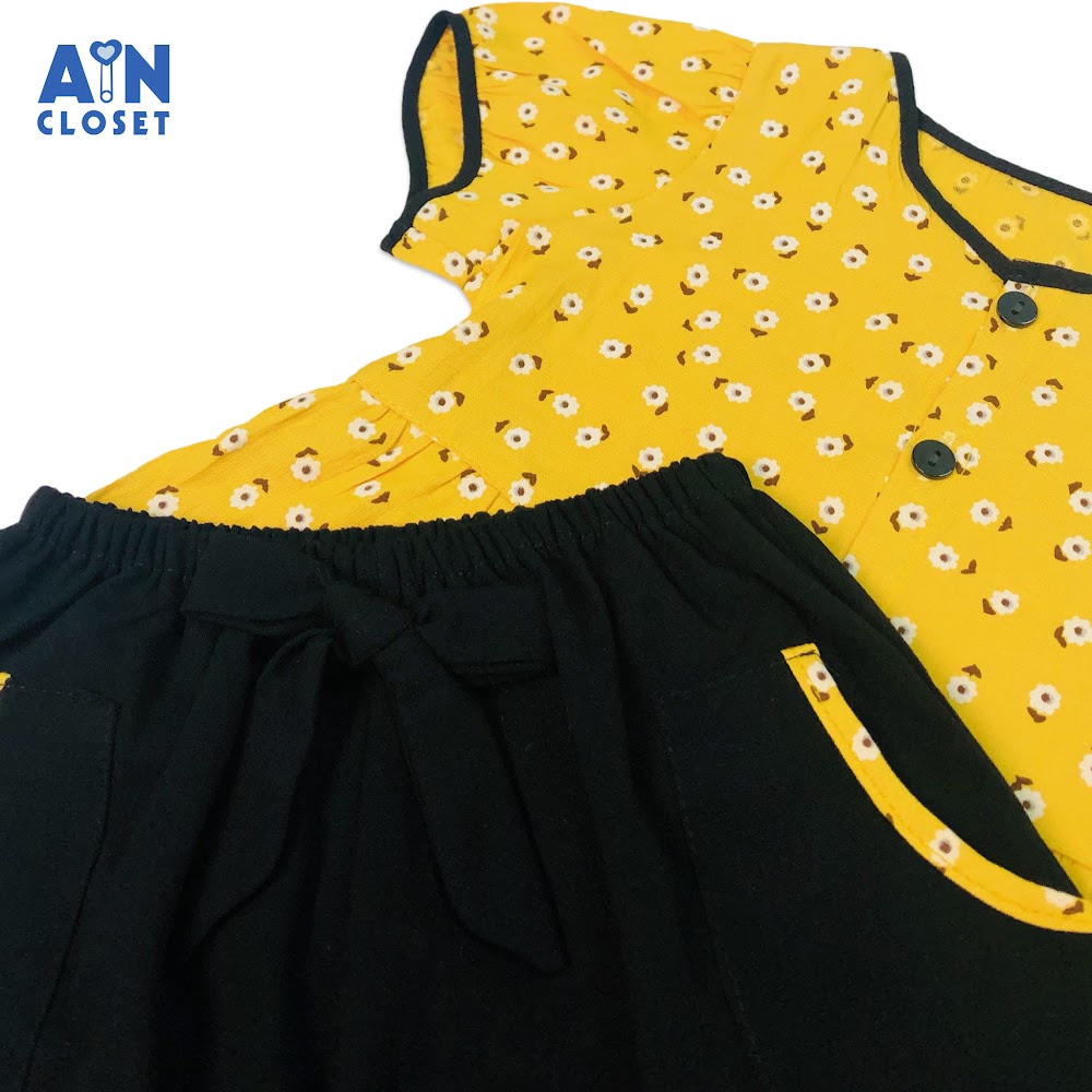 Bộ quần áo lửng bé gái họa tiết hoa Chấm bi trắng nền vàng linen - AICDBGAP3CWO - AIN Closet