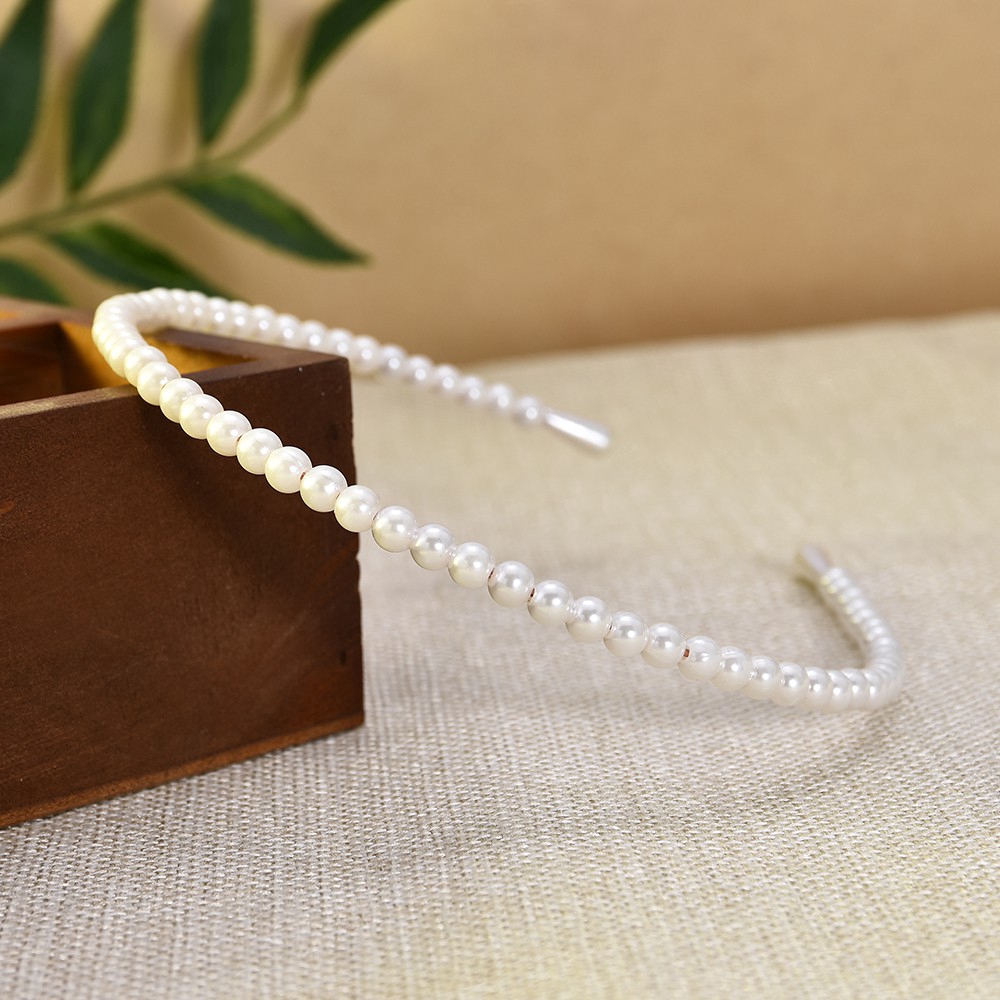 Băng đô đính ngọc trai giả thanh lịch