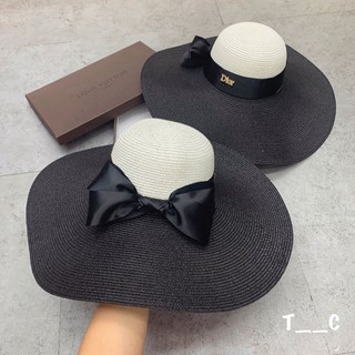 Mũ đi biển rộng vành nơ lụa