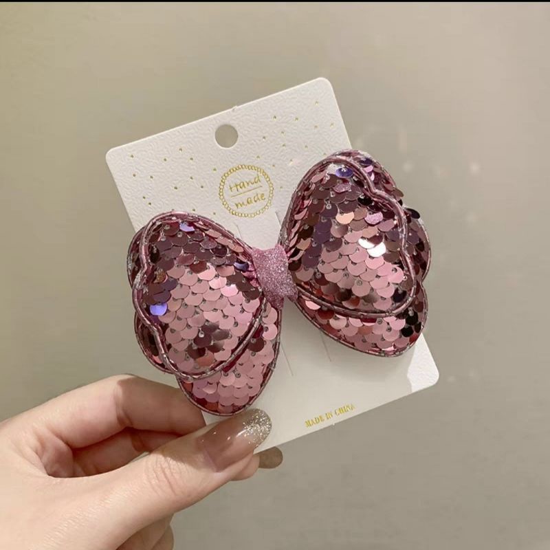 Kẹp tóc nơ đính kim sa xinh xắn cho bé