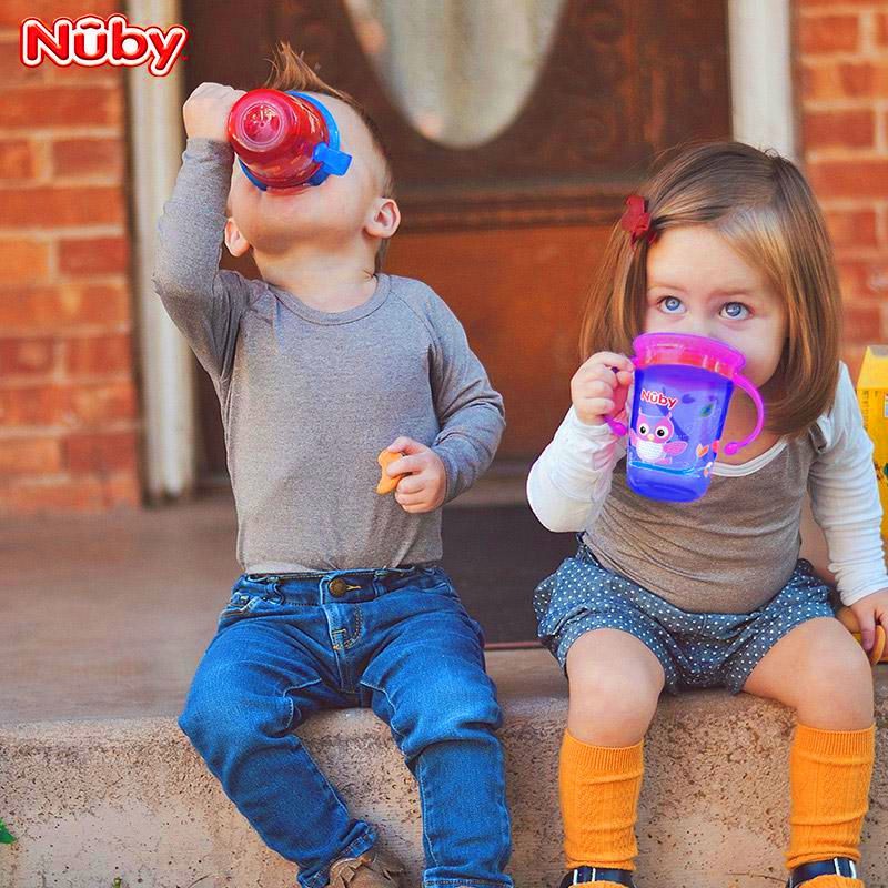 Nuby Nubby Children Cốc nước mẫu giáo bé mới bỏ học ma thuật cách uống với xử lý, rơi và chống rò rỉ