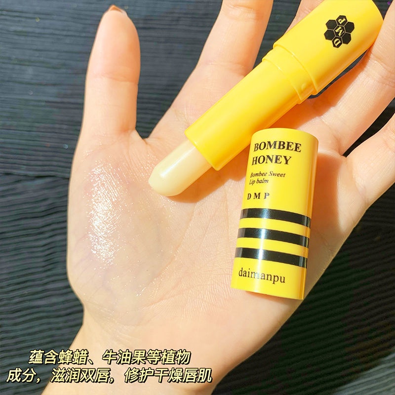 Son Dưỡng Môi Daimanpu Chiết Xuất Mật Ong Dưỡng Ẩm Tẩy Tế Bào Chết