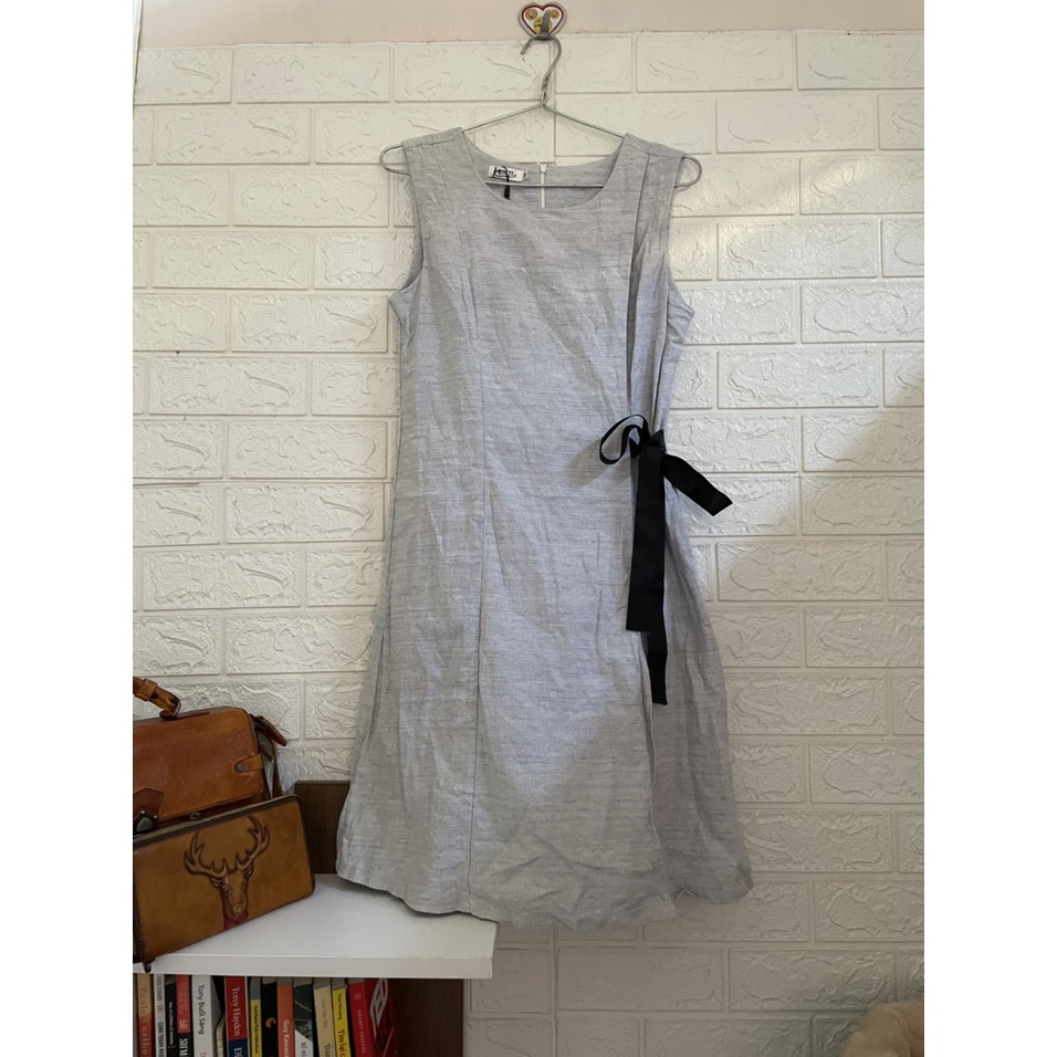 Đầm suông đắp tà cột nơ bên eo