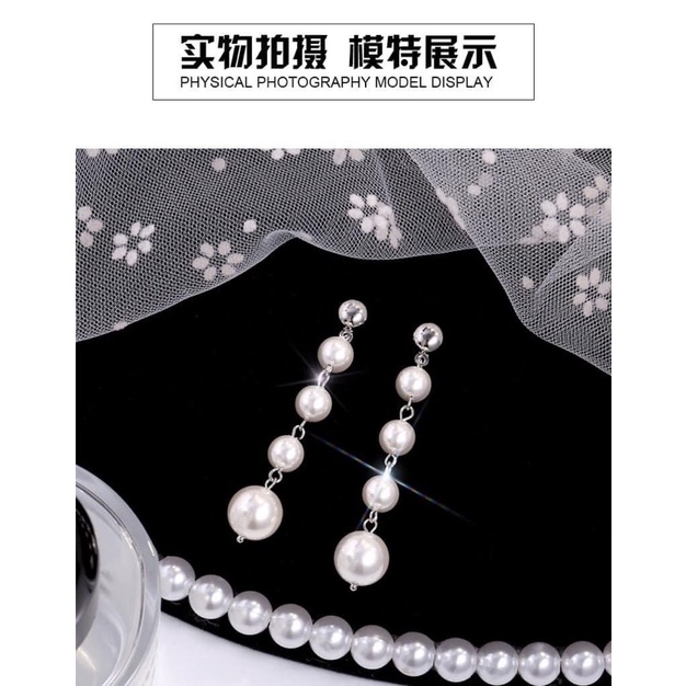 Bông tai Ngọc trắng dài 3 hạt đến 4 hạt..