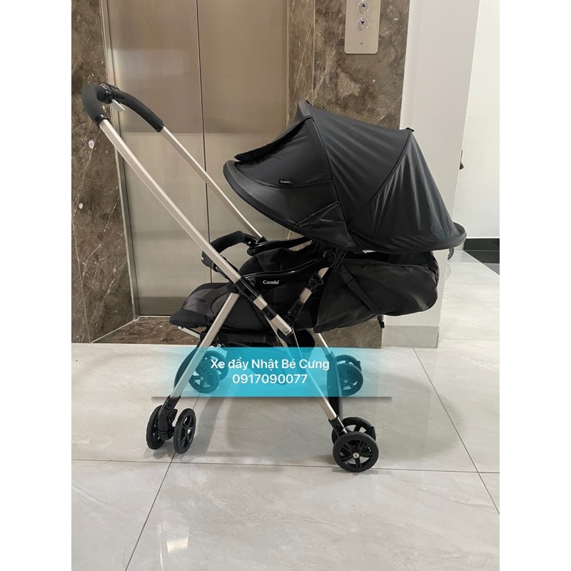 xe đẩy combi mechacal first white lable đen phối mái