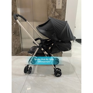 Xe đẩy combi mechacal first white lable đen phối mái