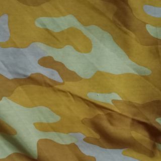 Cotton rằn ri vàng phối vàng đất chất thun 2 chiều