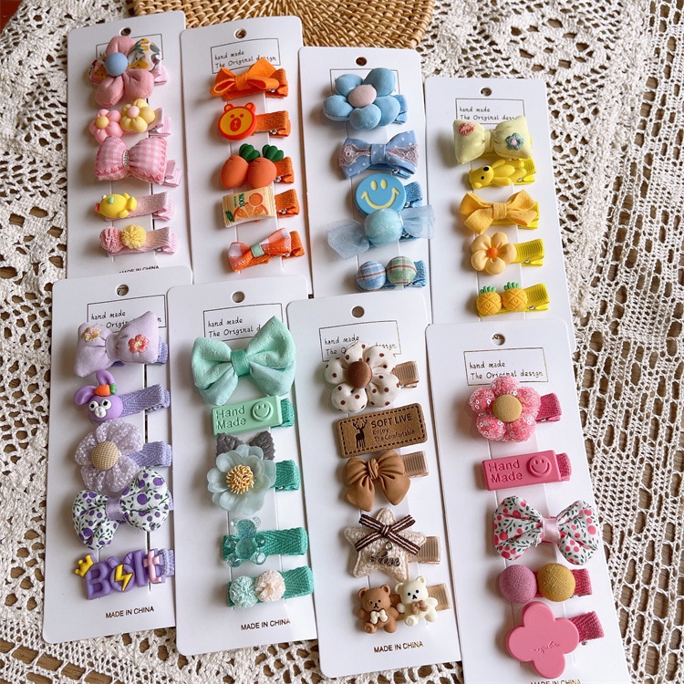 Vĩ 5 kẹp mái hàn quốc bé gái phối icon hoạt hình nơ xinh -K509