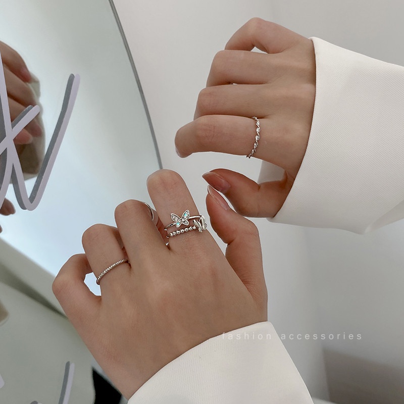 Bộ 4 Nhẫn Hình Cánh Bướm Xoắn Đôi Màu Bạc Thời Trang Cho Nữ