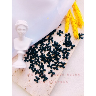 charm nơ trắng đen gắn móng tay