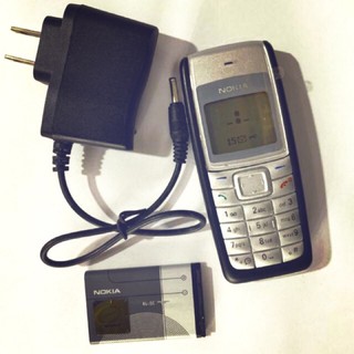 xạc nokia 110i chân tròn to