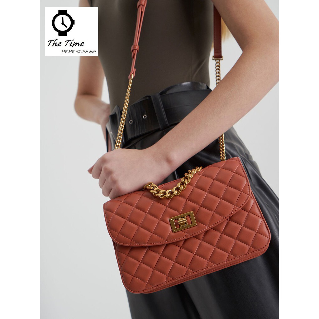 ( Sẵn) Túi Charles and Keith nữ – Charles and Keith Quilted Turn-Lock Clutch CK2-70701062-1 size 22.5x16x9.5cm.
