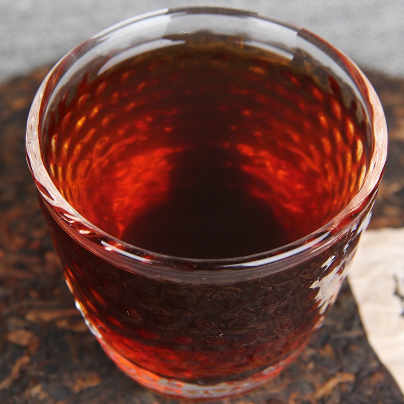 BÁNH TRÀ PHỔ NHĨ CHÍN VÂN NAM KIM NHA LÃO BAN CHƯƠNG 11 NĂM TUỔI 357 GRAM (NĂM SẢN XUẤT 2011)