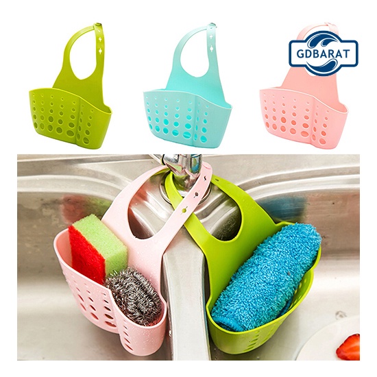 Giỏ đựng miếng xốp rửa chén có hai ngăn đục lỗ thoát nước giúp sắp xếp gọn gàng cho bồn rửa chén