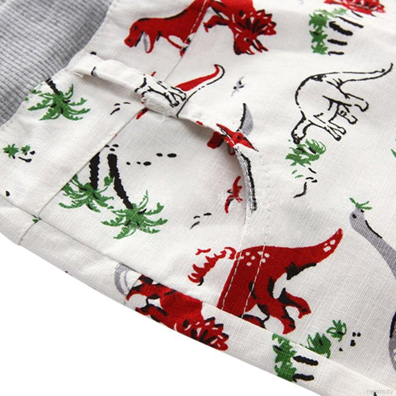 Quần short đi biển in hình khủng long dễ thương cho bé trai