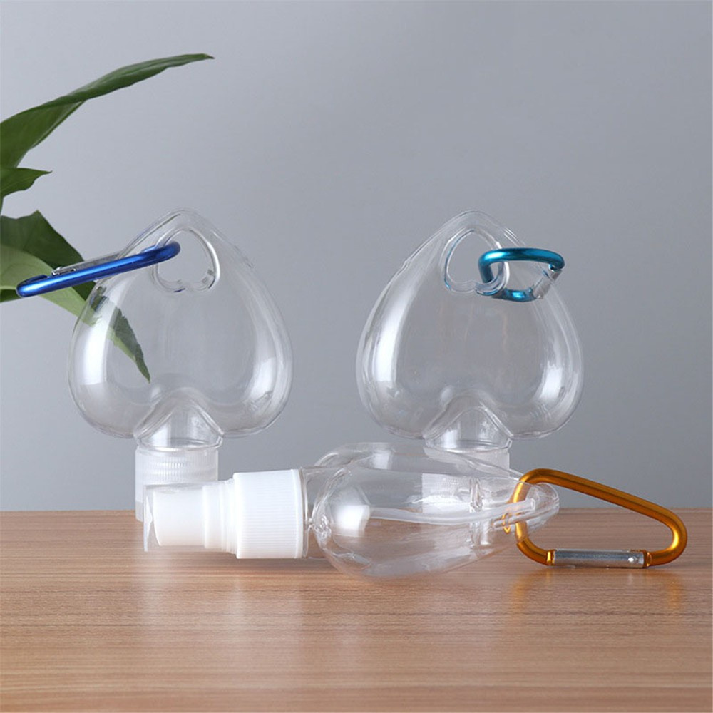 [Hàng mới về] Chai rỗng hình trái tim dạng xịt dùng đựng dung dịch rửa tay màu trong suốt có móc treo tiện dụng 50ml