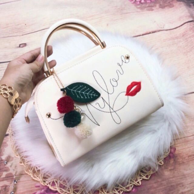 Túi mylove kem phụ kiện quả bông