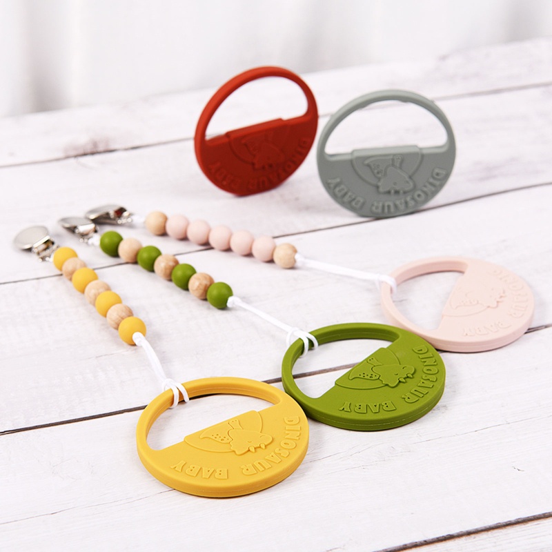 Vòng Tay Silicone Hình Khủng Long Đa Năng Cho Bé Ngậm Mọc Răng