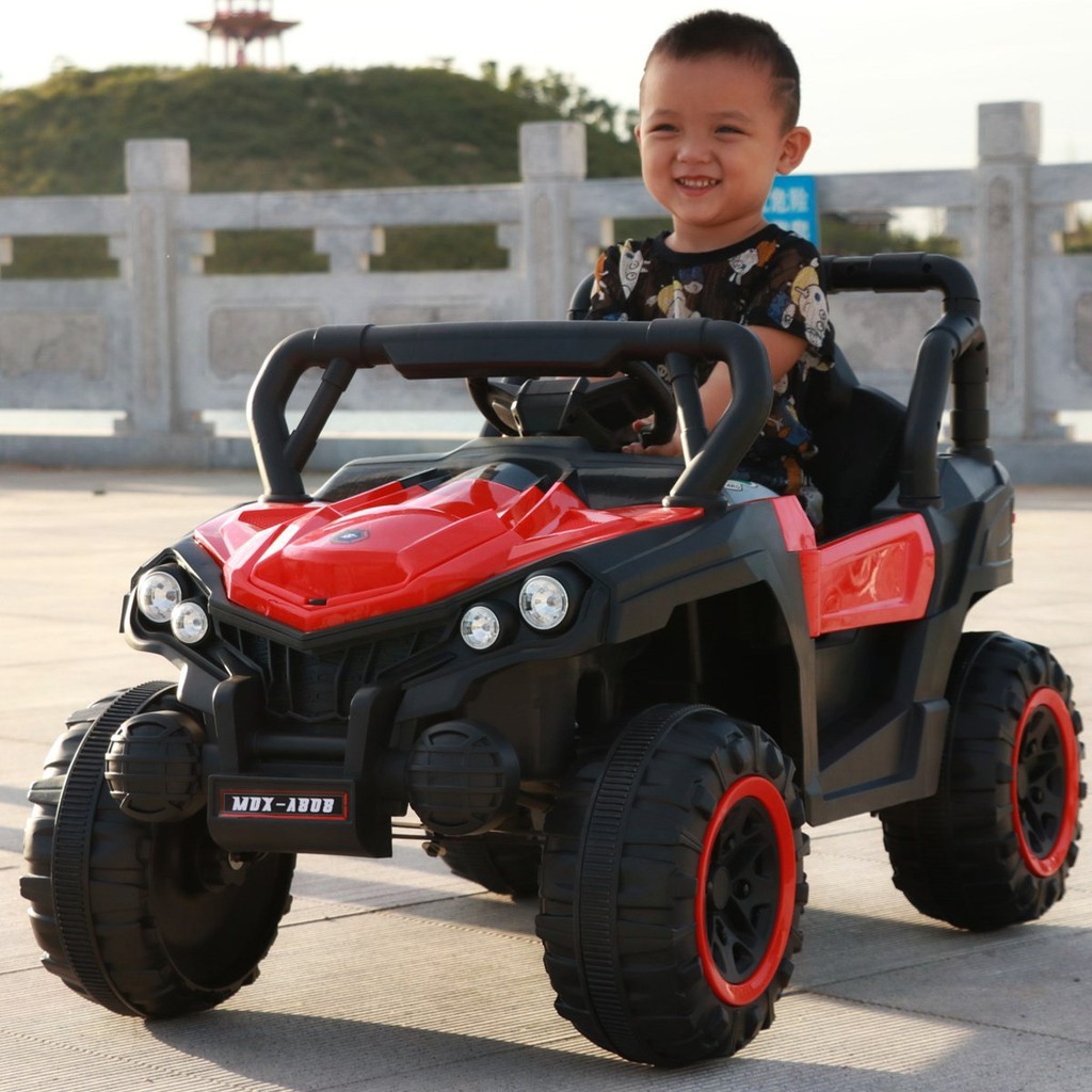 Ô tô xe điện địa hình MDX-A909 đồ chơi vận động cho bé 2 ghế (Đỏ-Trắng-Xanh)