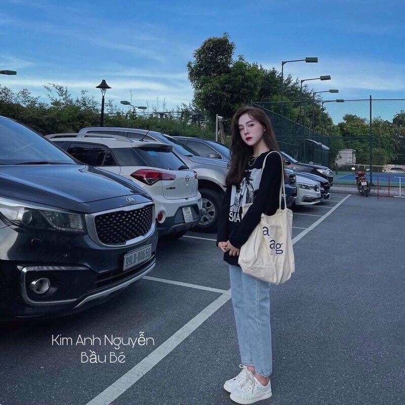 Áo thun dài tay Cô Gái sẻ tà