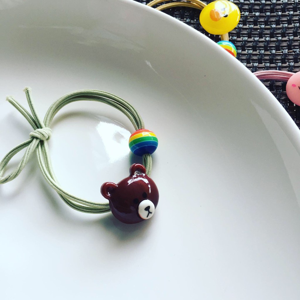 Cột tóc hình thú và bi cầu vồng