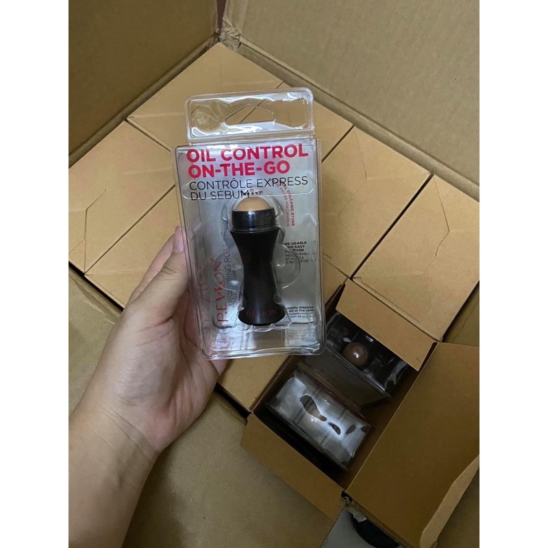 Thanh lăn hút dầu Revlon, massage mặt bằng Đá núi lửa