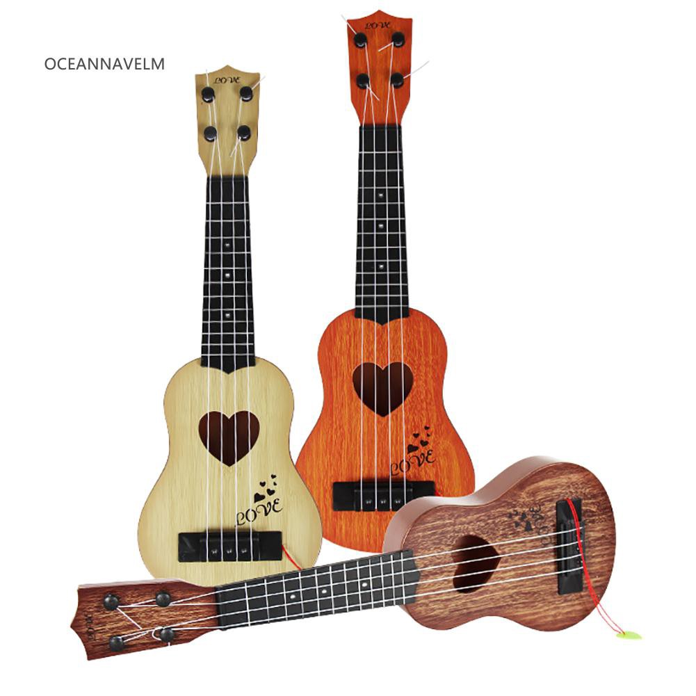 Đàn ghi ta ukulele mini bốn dây phong cách cổ điển dùng dạy học âm nhạc cho bé