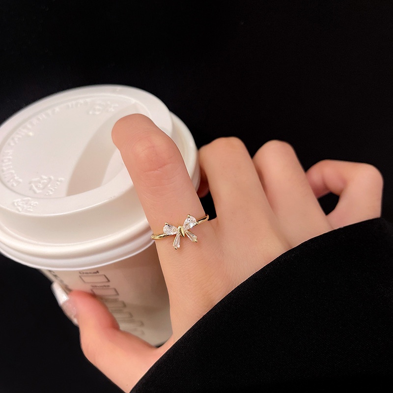 Nhẫn RINHOO mạ bạc 925 hình nơ đính đá kim cương phong cách Hàn Quốc