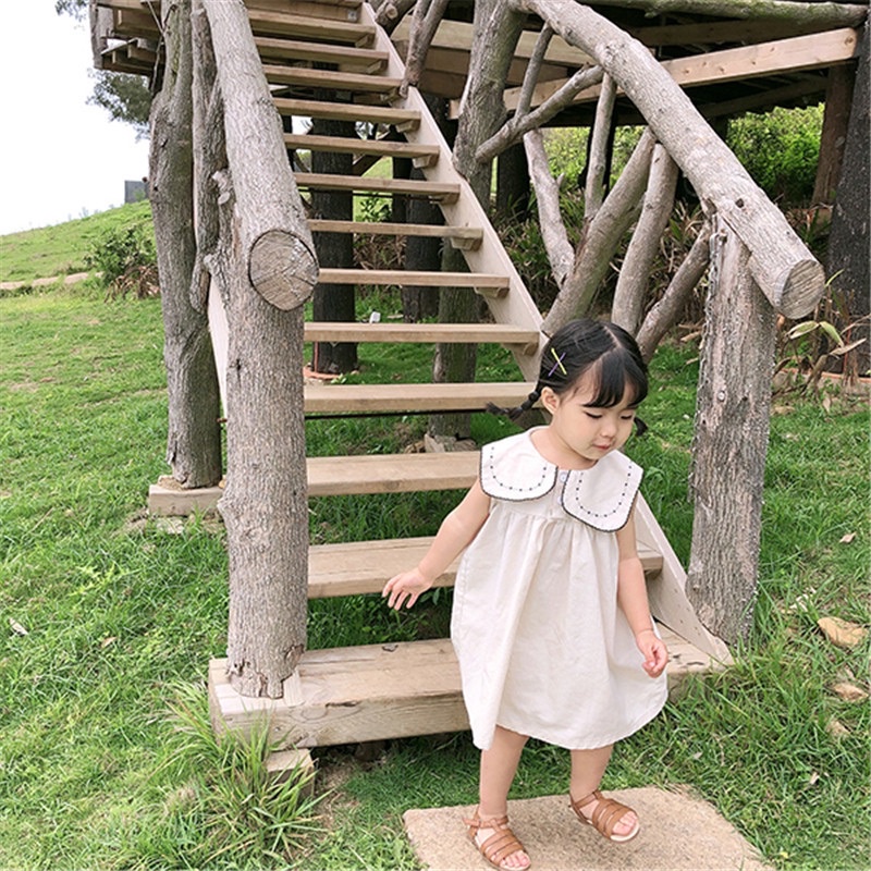 Váy cho bé chất thô cổ cách điệu