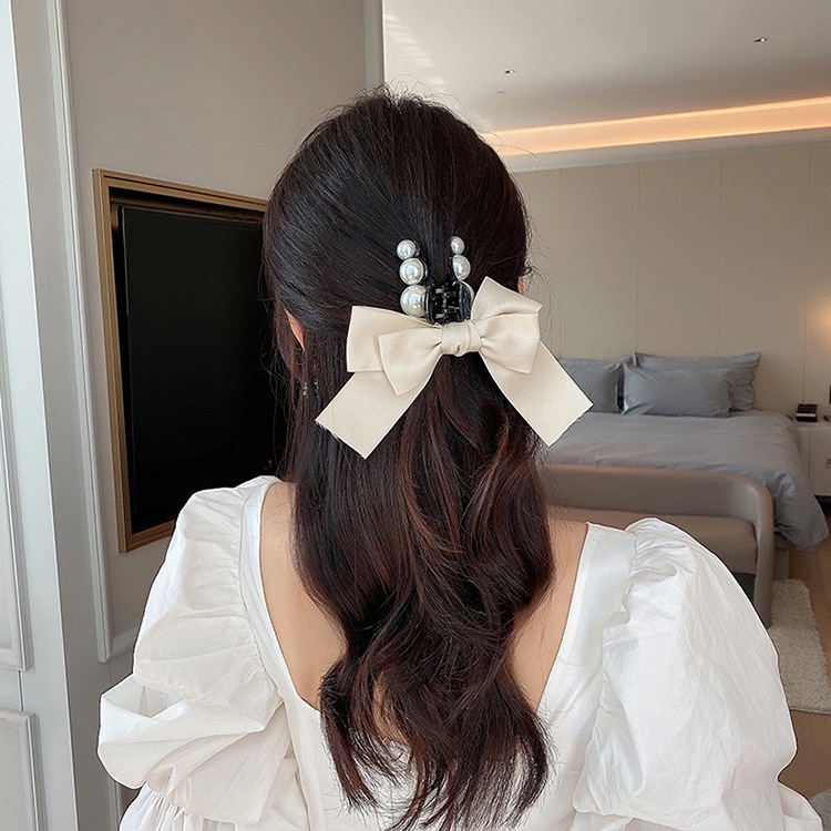 Kẹp tóc hình nơ đính ngọc trai nhân tạo thời trang