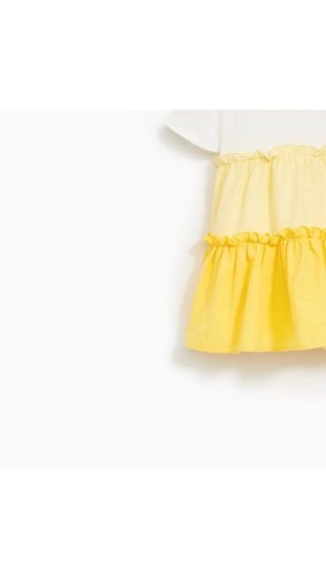 Váy bé gái đi biển vàng chanh