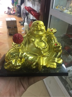 Tượng di lặc để xe ô tô