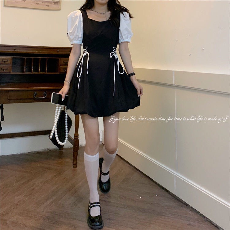 Váy chữ A tay trắng có dây nơ rút 2 bên xinh xắn