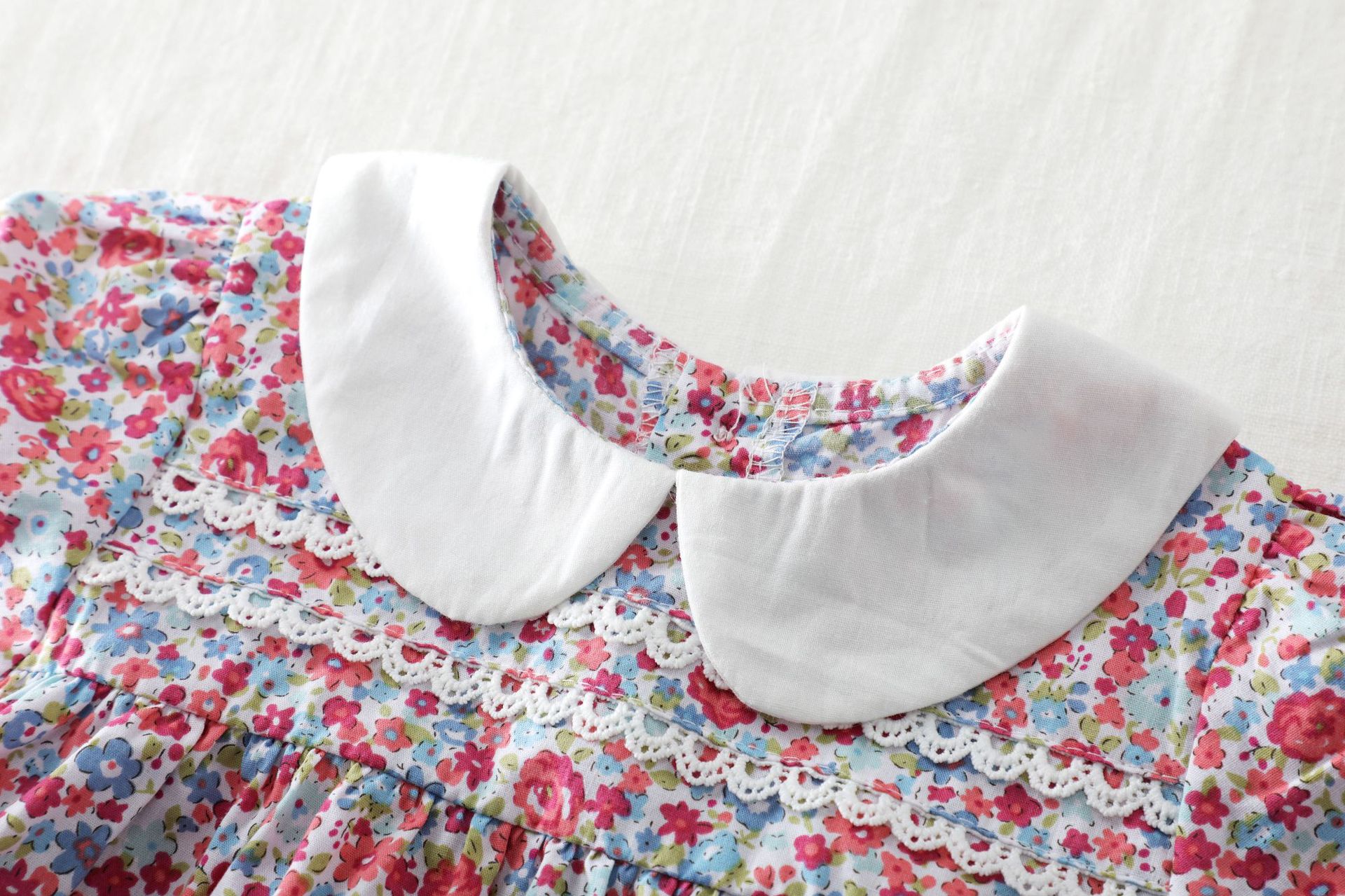 Bộ đầm in họa tiết hoa màu tím + quần ngắn đáng yêu cho bé gái