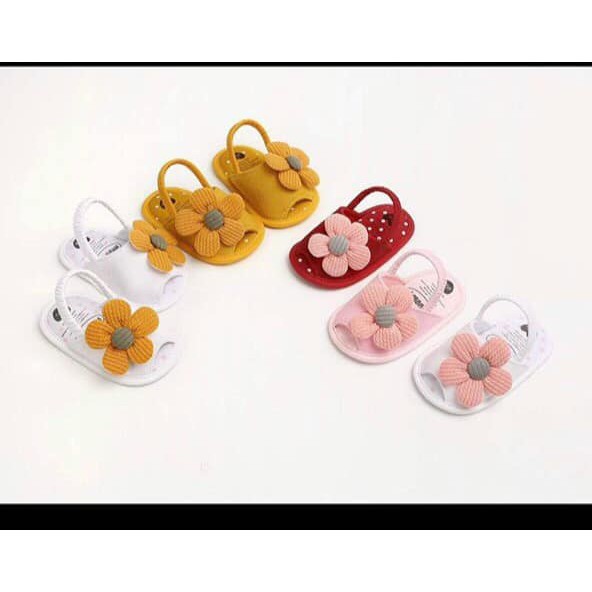 Giày tập đi hoa mai cho bé
