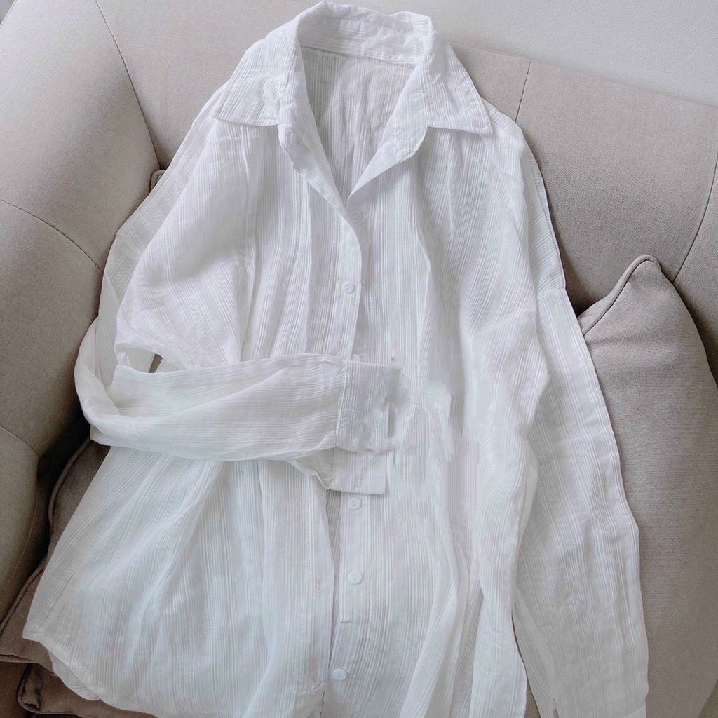 Áo sơ mi trắng dáng oversize chất đũi xước