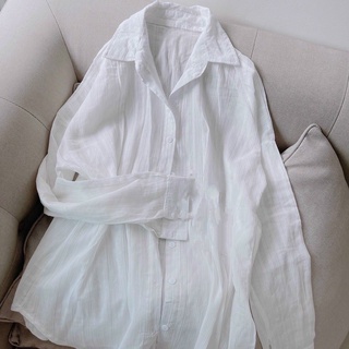 Áo sơ mi trắng dáng oversize chất đũi xước