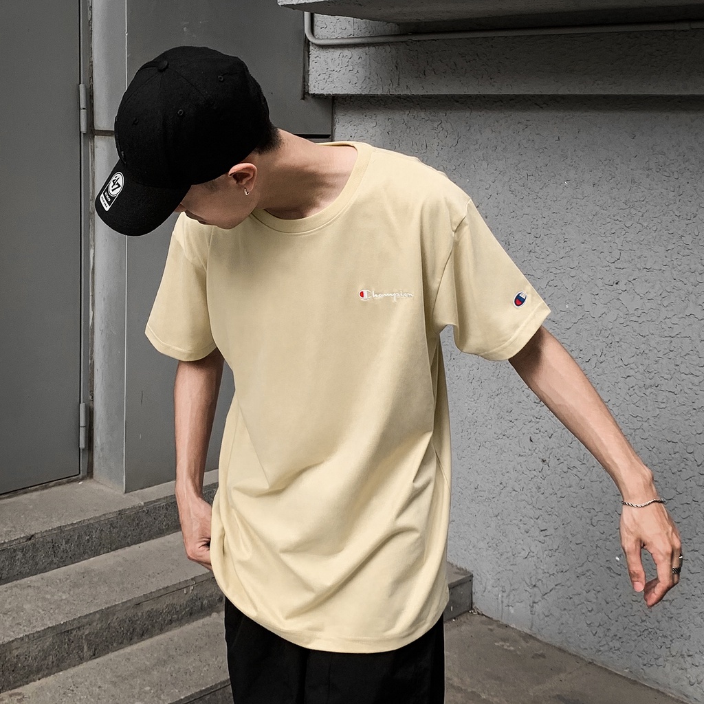 Áo Thun Champion Màu Tan Thêu Chữ Màu Trắng Chất Liệu 100% Cotton Thoáng Mát Form Rộng Thoải Mái