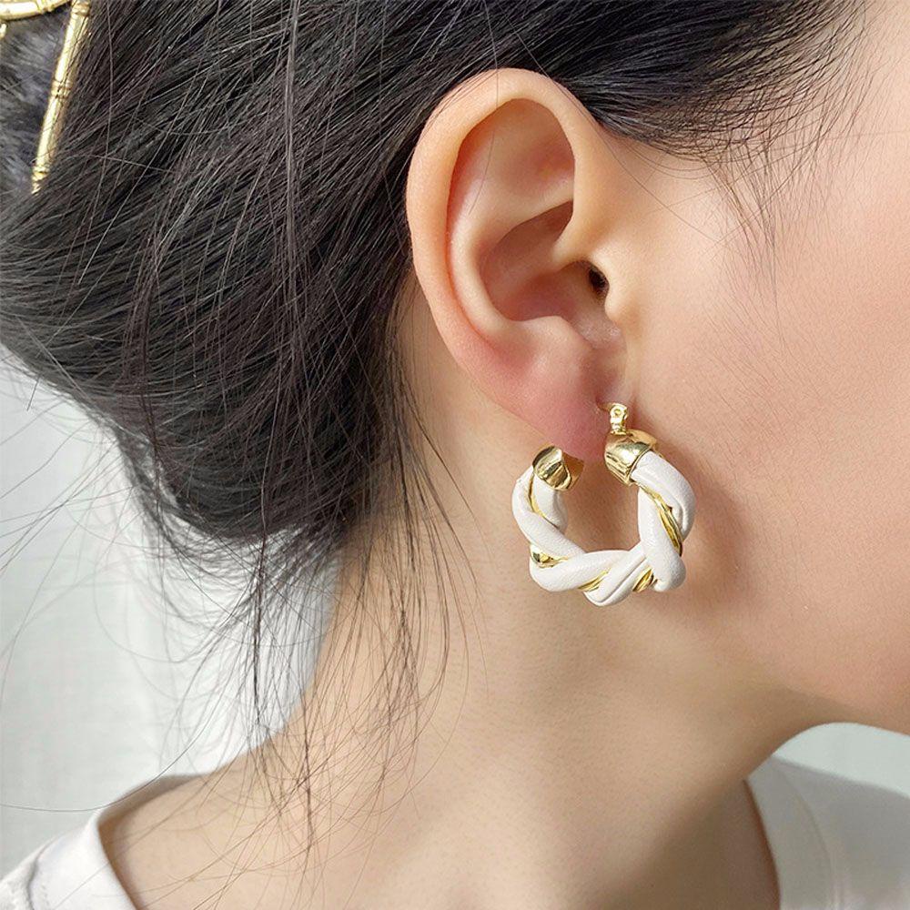Bông Tai Dạng Vòng Xoắn Bằng Da PU Phối Hợp Kim Phong Cách Hàn Quốc Dành Cho Bạn Nữ