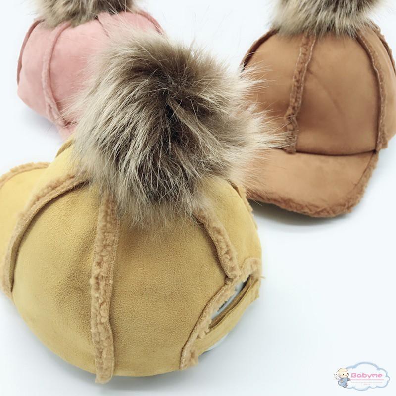 Mũ lưỡi trai màu trơn đính quả bông dễ thương cho bé