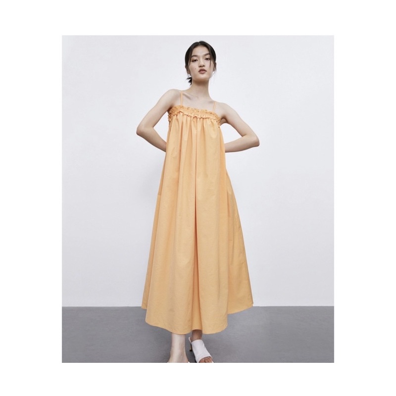 (CÓ SẴN) Váy URBAN màu vàng maxi dài qua gối hai dây
