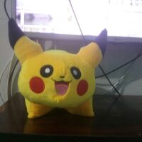 Gối xe máy hình pikachu cho bé