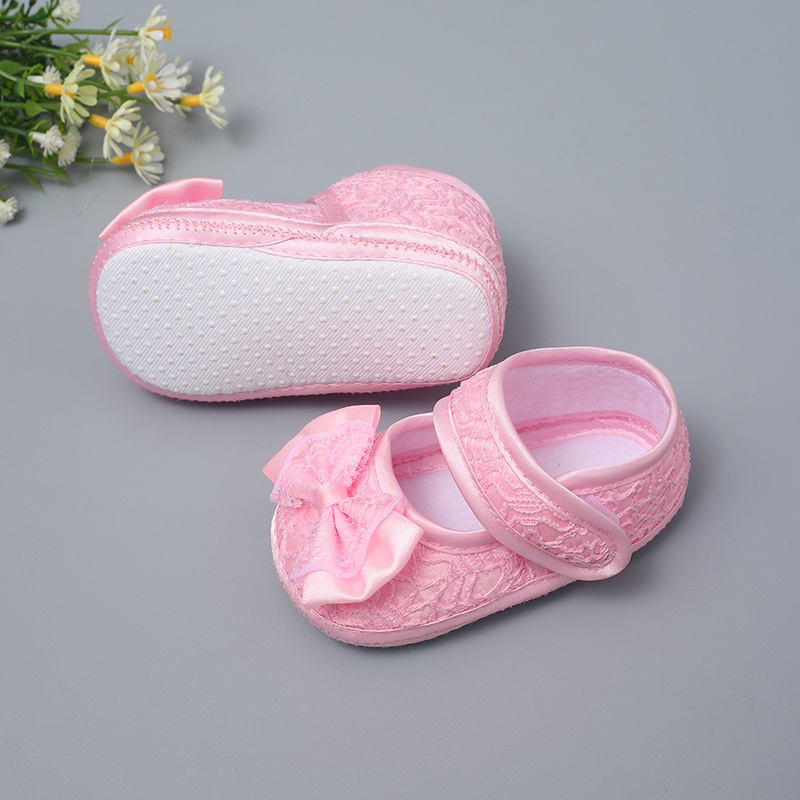Giày đế mềm chống trượt đính nơ xinh xắn cho bé gái tập đi