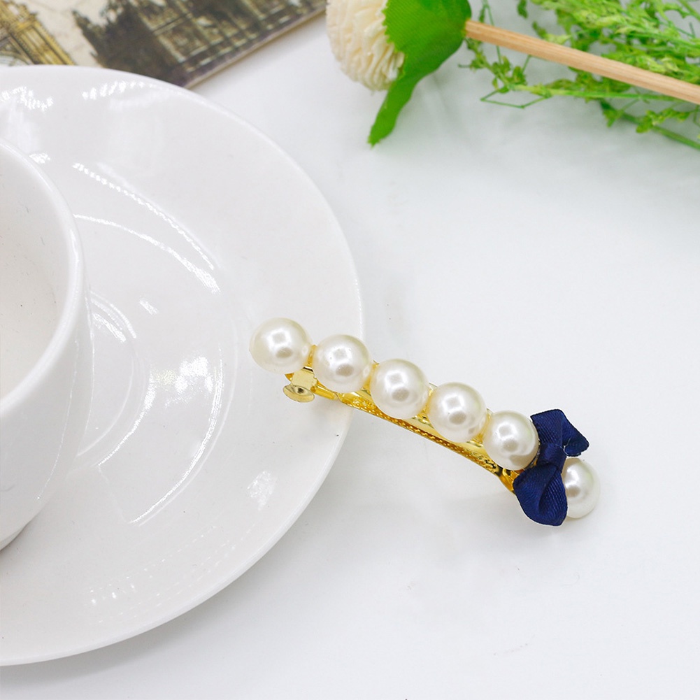 Kẹp tóc nơ đính ngọc trai xinh xắn cho nữ