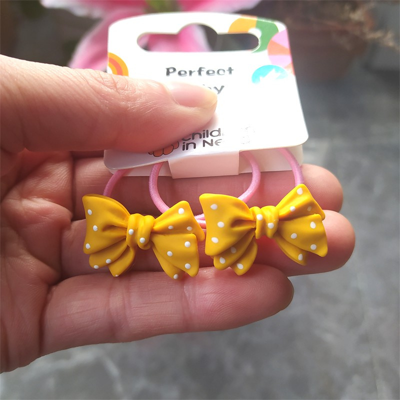 Set 2 Dây Cột Tóc Co Giãn Hình Nơ Hoạt Hình Dễ Thương Cho Bé Gái