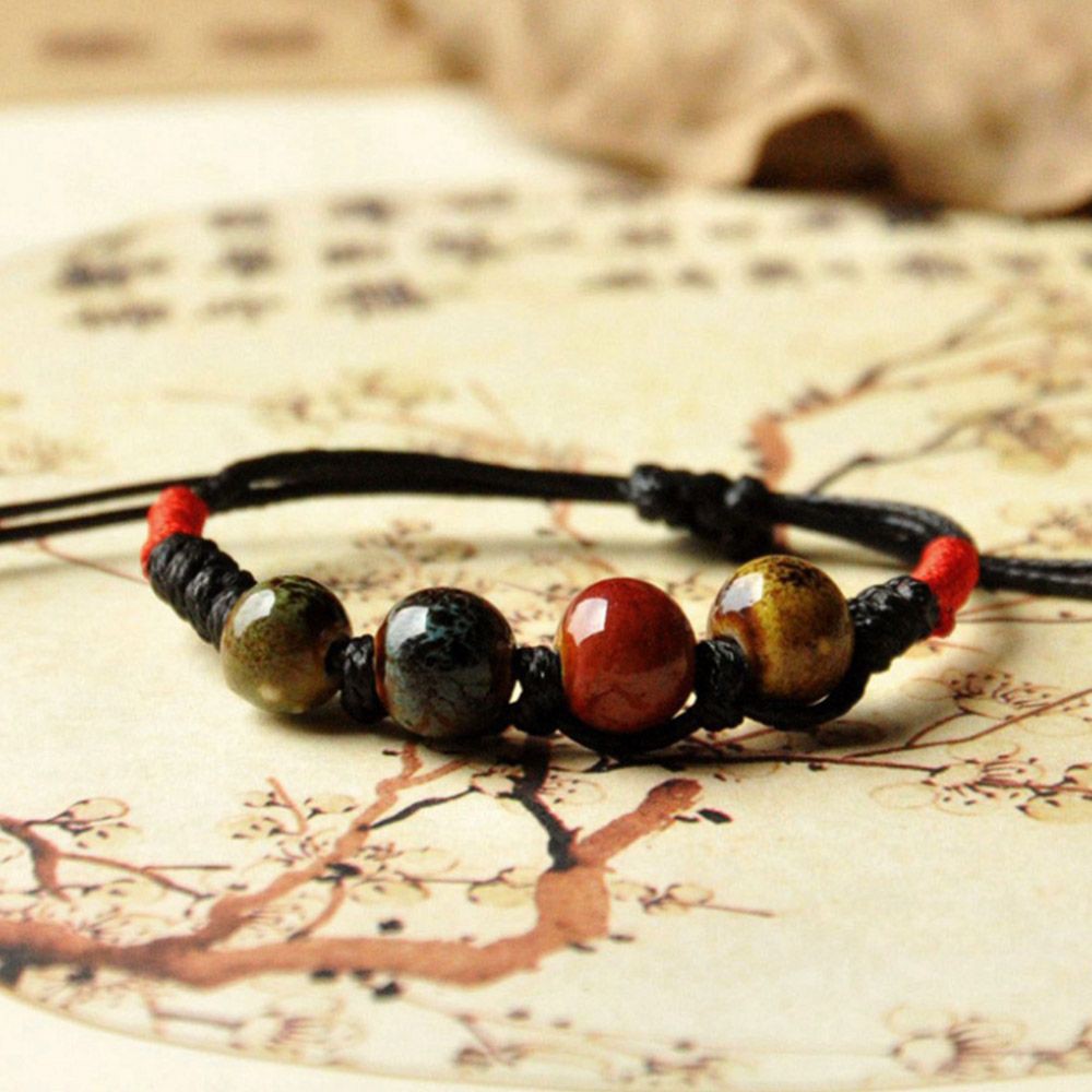 Vòng Đeo Tay Kết Hạt Sứ Hình Chiếc Lá Cho Nam Và Nữ