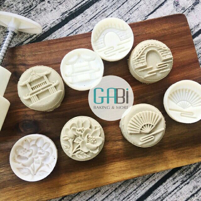 Khuôn trung thu nhấn lò xo 4 mặt 50-80g đền-cầu-quạt-hoa